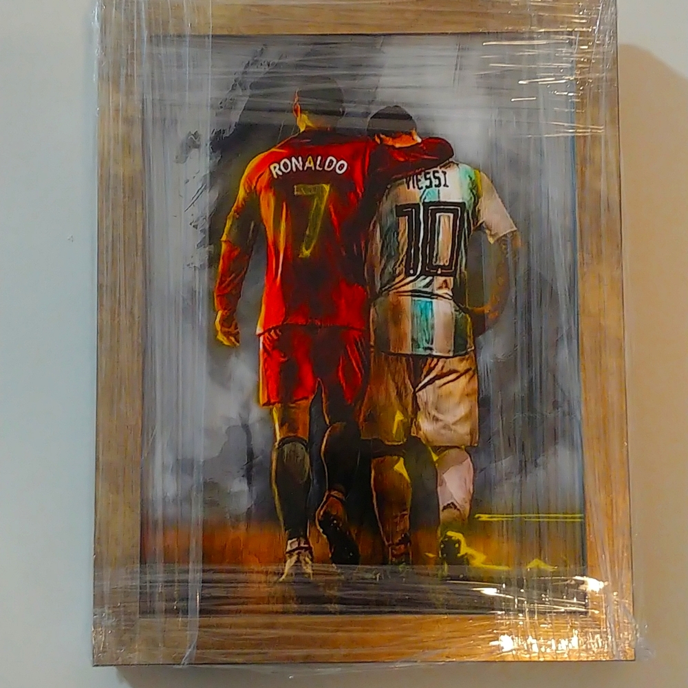 Laminated framed print - Ronaldo and Messi